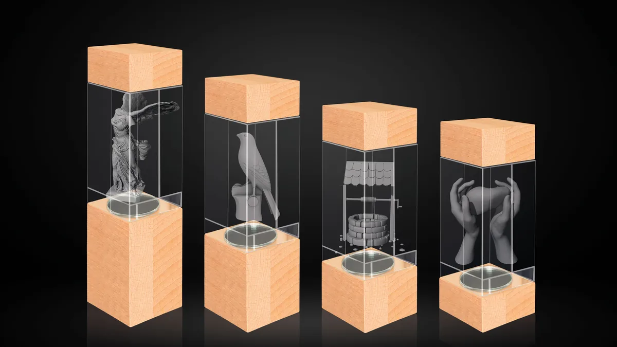 Trofeos de cristal con grabado laser 3D sobre base de madera
